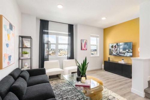 90 Heirloom Passage Se, Calgary, AB - Indoor Photo Showing Living Room