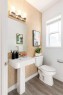 90 Heirloom Passage Se, Calgary, AB  - Indoor Photo Showing Bathroom 