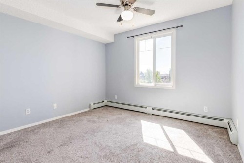 1319-8810 Royal Birch Boulevard Nw, Calgary, AB - Indoor Photo Showing Other Room