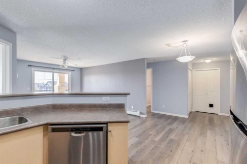 1319-8810 Royal Birch Boulevard Nw, Calgary, AB - Indoor Photo Showing Kitchen