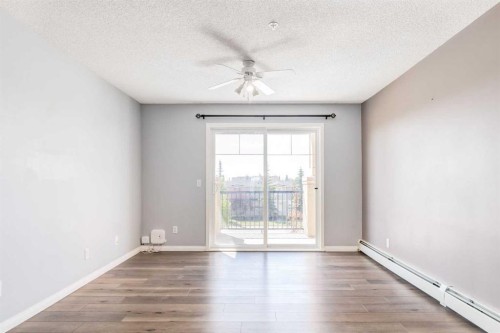 1319-8810 Royal Birch Boulevard Nw, Calgary, AB - Indoor Photo Showing Other Room