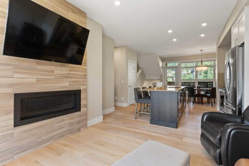 407 Riva Place, Canmore, AB - Indoor Photo Showing Living Room With Fireplace