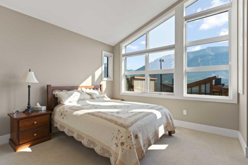 407 Riva Place, Canmore, AB - Indoor Photo Showing Bedroom