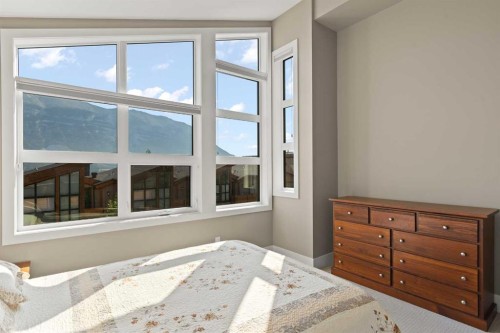 407 Riva Place, Canmore, AB - Indoor Photo Showing Bedroom