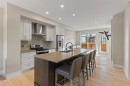 407 Riva Place, Canmore, AB  - Indoor Photo Showing Kitchen With Upgraded Kitchen 