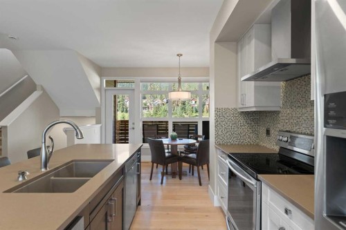 407 Riva Place, Canmore, AB - Indoor Photo Showing Kitchen With Double Sink With Upgraded Kitchen
