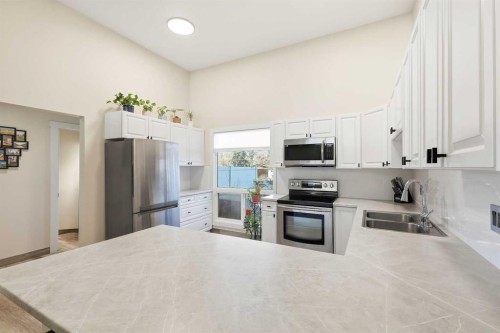 443 Brae Glen Crescent Sw, Calgary, AB - Indoor Photo Showing Kitchen With Double Sink