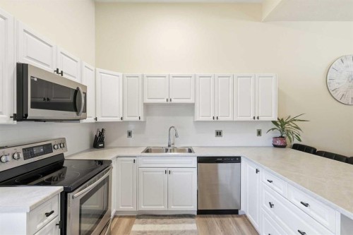 443 Brae Glen Crescent Sw, Calgary, AB - Indoor Photo Showing Kitchen With Double Sink