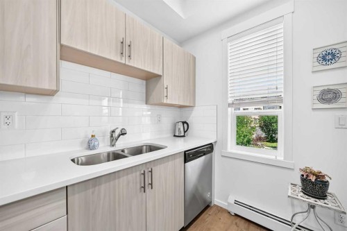 4207-215 Legacy Boulevard Se, Calgary, AB - Indoor Photo Showing Kitchen With Double Sink With Upgraded Kitchen