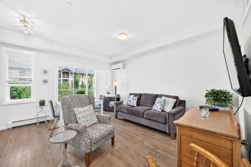 4207-215 Legacy Boulevard Se, Calgary, AB - Indoor Photo Showing Living Room