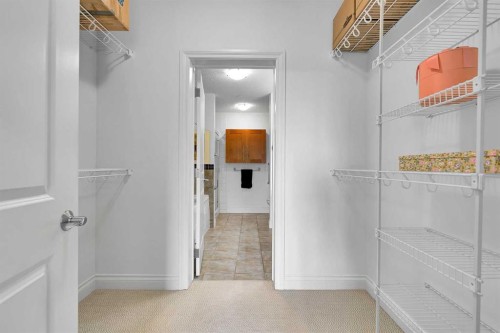 2105-10221 Tuscany Boulevard Nw, Calgary, AB - Indoor With Storage