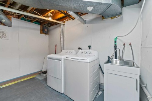 5923 Thorncliffe Drive Nw, Calgary, AB - Indoor Photo Showing Laundry Room