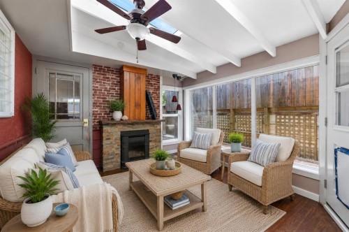 5923 Thorncliffe Drive Nw, Calgary, AB - Indoor Photo Showing Other Room With Fireplace