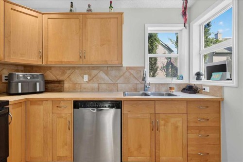 137 Bridlewood Lane Sw, Calgary, AB - Indoor Photo Showing Kitchen With Double Sink