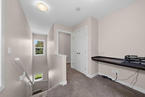 464 Quarry Villas Se, Calgary, AB - Indoor Photo Showing Other Room
