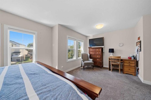 464 Quarry Villas Se, Calgary, AB - Indoor Photo Showing Bedroom