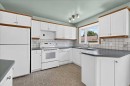 7727 Bowcliffe Crescent Nw, Calgary, AB  - Indoor Photo Showing Kitchen With Double Sink 
