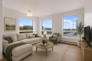 1114-8500 19 Avenue Se, Calgary, AB  - Indoor Photo Showing Living Room 