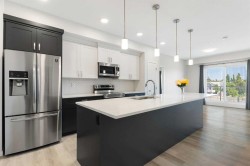 305-200 Harvest Hills Place NE Calgary, AB T3K 2N3