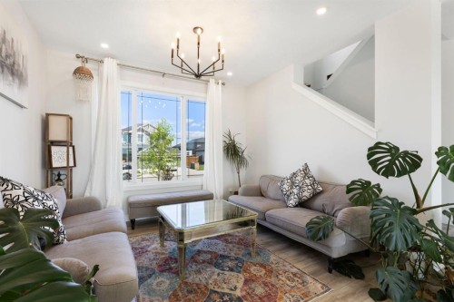 183 Brander Avenue, Langdon, AB - Indoor Photo Showing Living Room
