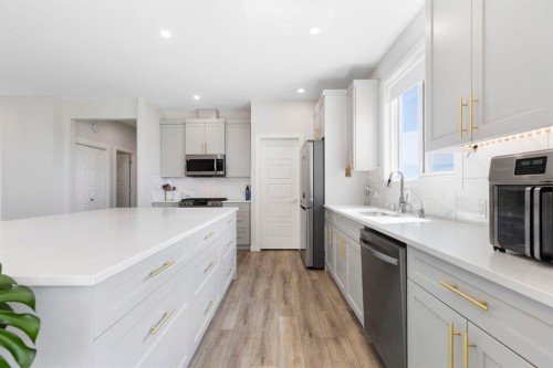 183 Brander Avenue, Langdon, AB - Indoor Photo Showing Kitchen With Upgraded Kitchen
