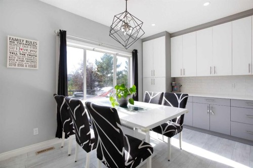 1925 Luxstone Park Sw, Airdrie, AB - Indoor Photo Showing Dining Room