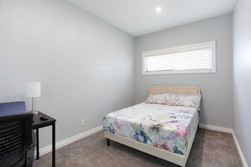 1925 Luxstone Park Sw, Airdrie, AB - Indoor Photo Showing Bedroom
