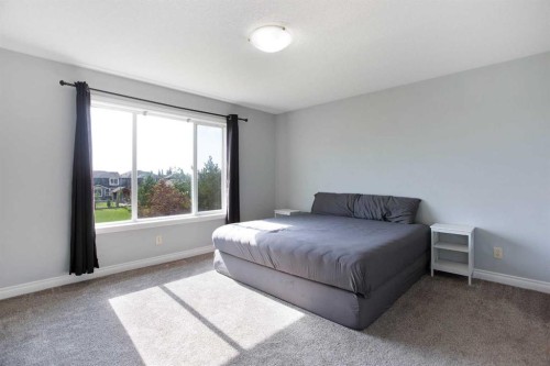 1925 Luxstone Park Sw, Airdrie, AB - Indoor Photo Showing Bedroom
