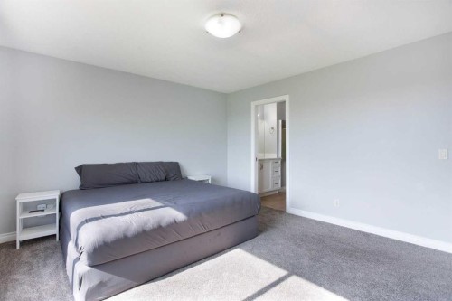 1925 Luxstone Park Sw, Airdrie, AB - Indoor Photo Showing Bedroom