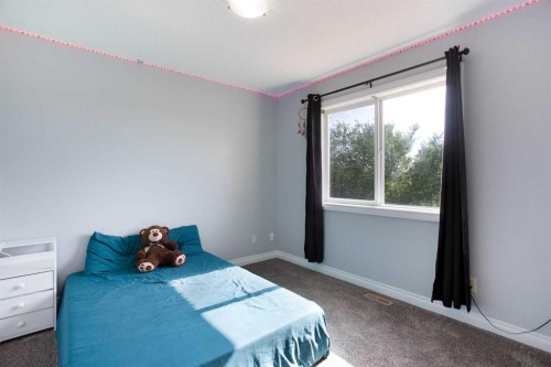 1925 Luxstone Park Sw, Airdrie, AB - Indoor Photo Showing Bedroom