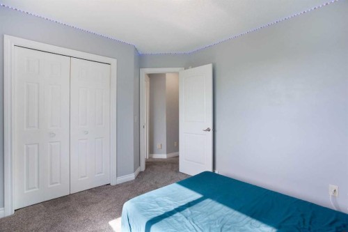 1925 Luxstone Park Sw, Airdrie, AB - Indoor Photo Showing Bedroom