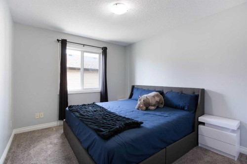 1925 Luxstone Park Sw, Airdrie, AB - Indoor Photo Showing Bedroom