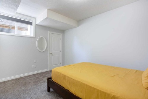 1925 Luxstone Park Sw, Airdrie, AB - Indoor Photo Showing Bedroom