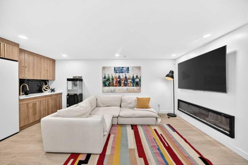 10909 Hidden Valley Drive Nw, Calgary, AB - Indoor Photo Showing Living Room With Fireplace