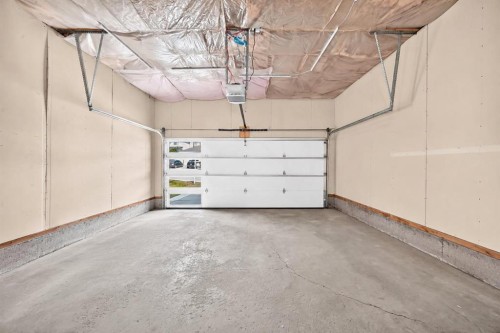 10909 Hidden Valley Drive Nw, Calgary, AB - Indoor Photo Showing Garage