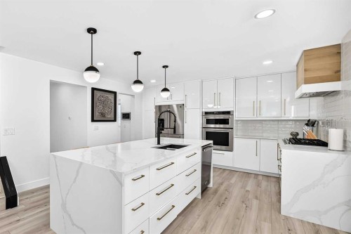 10909 Hidden Valley Drive Nw, Calgary, AB - Indoor Photo Showing Kitchen With Upgraded Kitchen