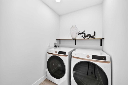 10909 Hidden Valley Drive Nw, Calgary, AB - Indoor Photo Showing Laundry Room