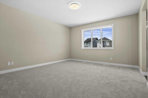 51 Agate Road, Cochrane, AB - Indoor Photo Showing Other Room