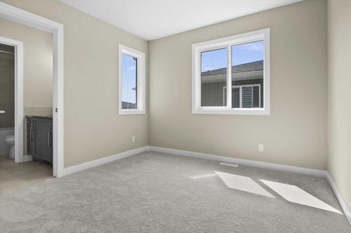 51 Agate Road, Cochrane, AB - Indoor Photo Showing Other Room