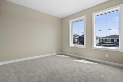 51 Agate Road, Cochrane, AB - Indoor Photo Showing Other Room