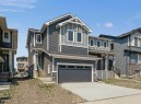 51 Agate Road, Cochrane, AB  - Outdoor With Facade 