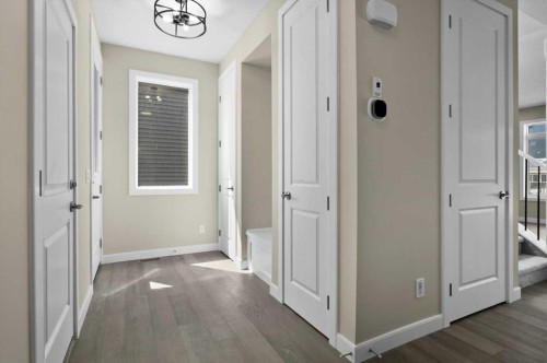 51 Agate Road, Cochrane, AB - Indoor Photo Showing Other Room