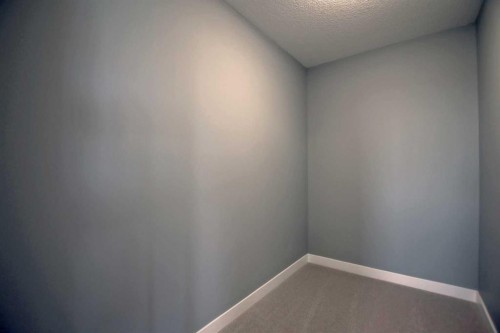 51 Agate Road, Cochrane, AB - Indoor Photo Showing Other Room