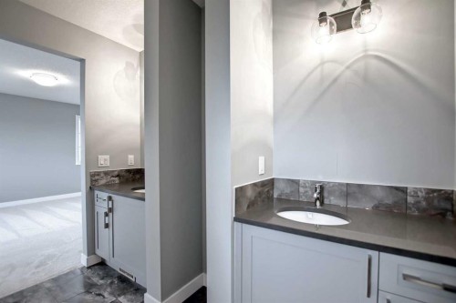 51 Agate Road, Cochrane, AB - Indoor Photo Showing Bathroom