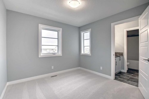 51 Agate Road, Cochrane, AB - Indoor Photo Showing Other Room