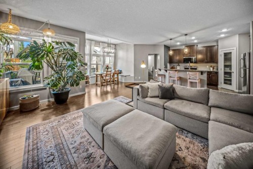 53 Heritage Drive, Cochrane, AB - Indoor Photo Showing Living Room