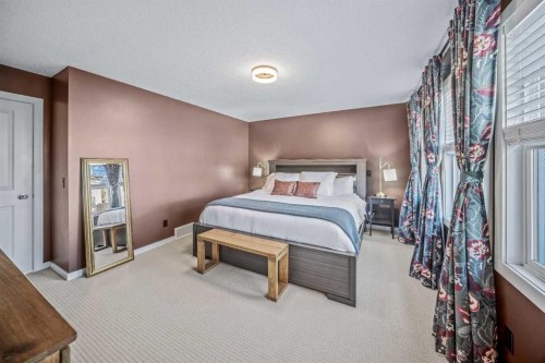 53 Heritage Drive, Cochrane, AB - Indoor Photo Showing Bedroom