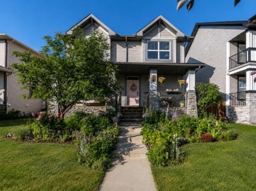 53 Heritage Drive, Cochrane, AB - Outdoor With Facade