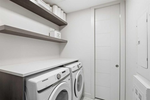 301-105 Lebel Crescent Nw, Calgary, AB - Indoor Photo Showing Laundry Room