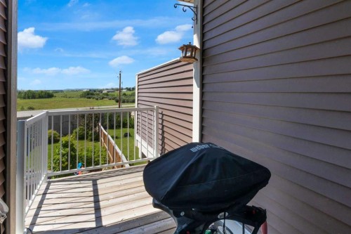 311 Sunrise View, Cochrane, AB - Outdoor With Exterior
